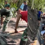 Satgas TMMD Kodim 1302/Minahasa Kebut Pengerasan Jalan Desa Watuliney